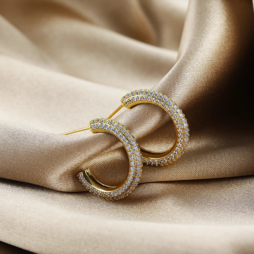 Showing cubic zirconia sparkle and gold plating