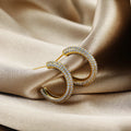 Showing cubic zirconia sparkle and gold plating