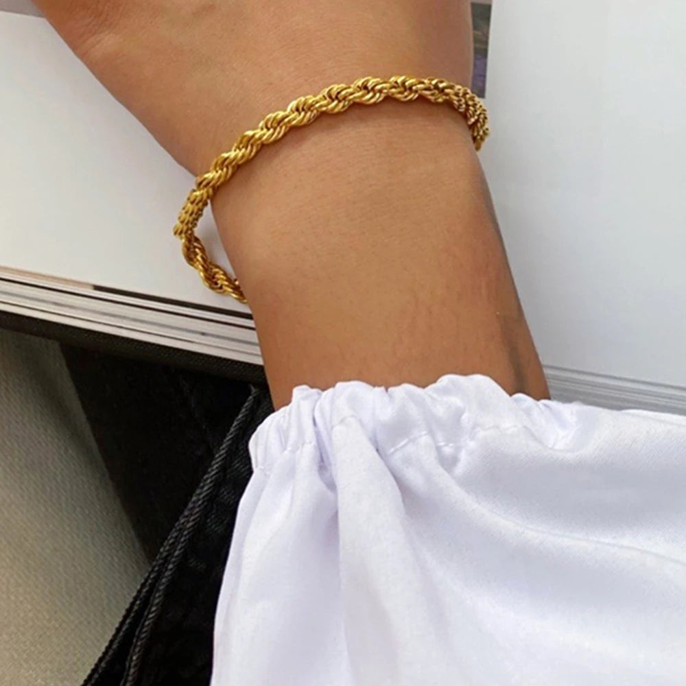 Geometric stainless steel bracelet in gold on wrist