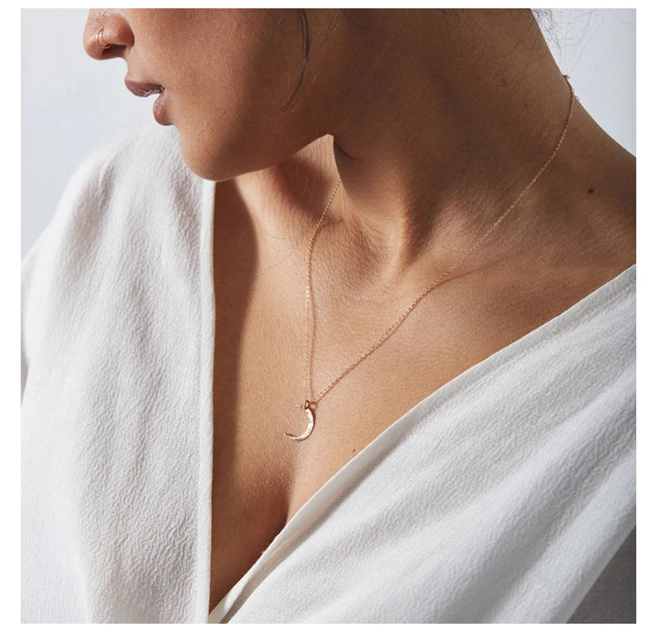 Elegant moon necklace for women featuring a premium stainless steel pendant with a minimalist celestial design, tarnish-resistant finish, and versatile styling for everyday fashion jewelry looks.