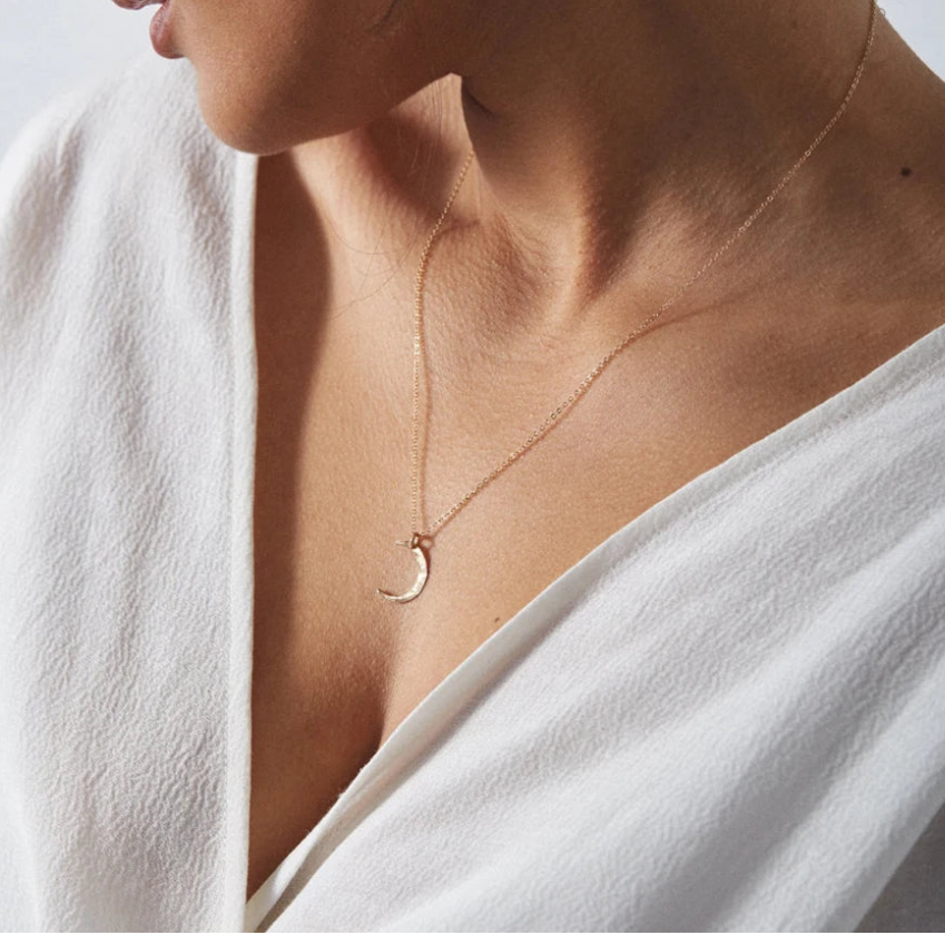 Elegant moon necklace for women featuring a premium stainless steel pendant with a minimalist celestial design, tarnish-resistant finish, and versatile styling for everyday fashion jewelry looks.
