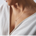 Elegant moon necklace for women featuring a premium stainless steel pendant with a minimalist celestial design, tarnish-resistant finish, and versatile styling for everyday fashion jewelry looks.
