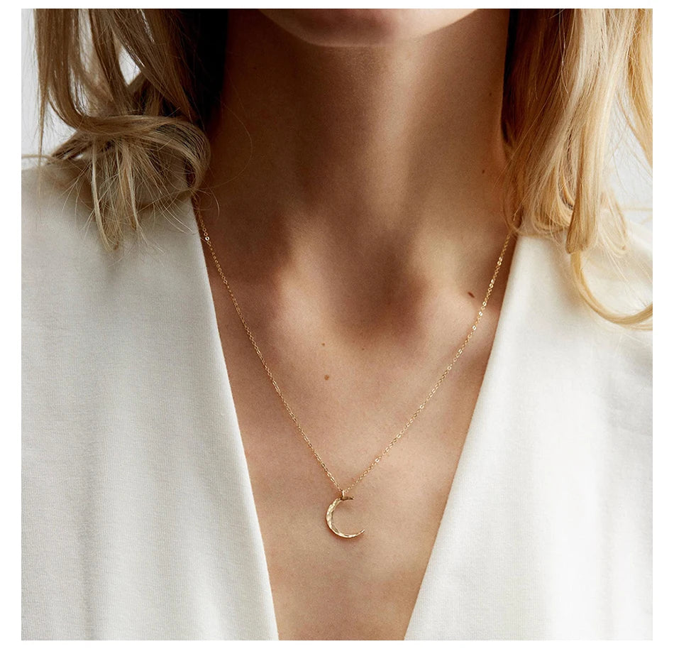 Elegant moon necklace for women featuring a premium stainless steel pendant with a minimalist celestial design, tarnish-resistant finish, and versatile styling for everyday fashion jewelry looks.