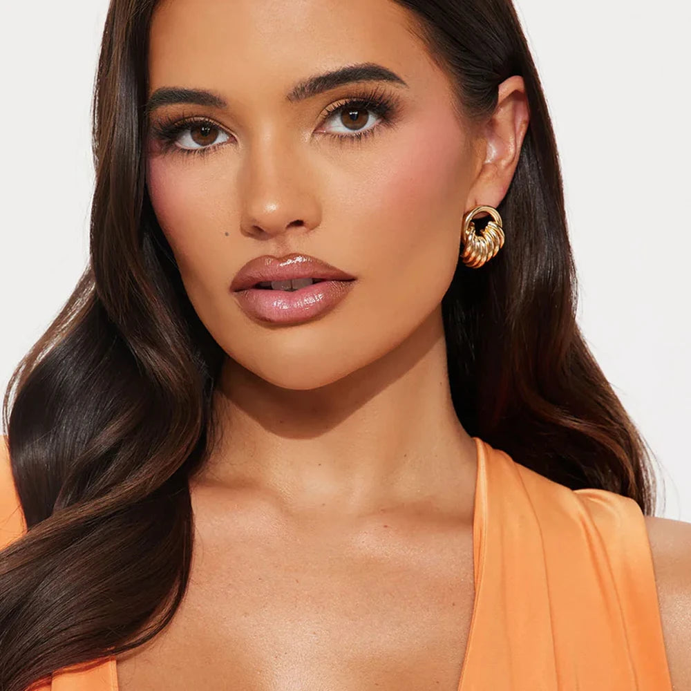 Round hoops earrings styled on models