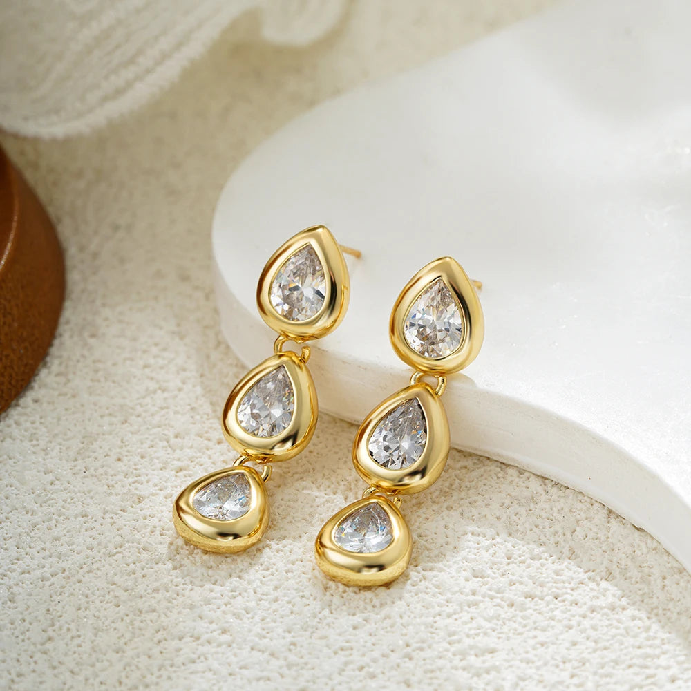 Geometric cubic zirconia drop earrings in 18k gold