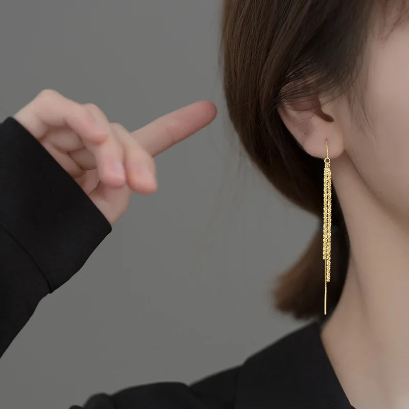 Long tassel drop earring in gold