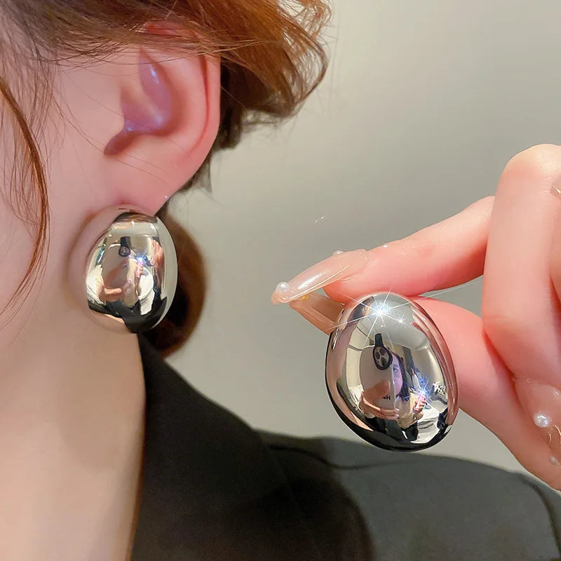 Geometric drop earring in silver