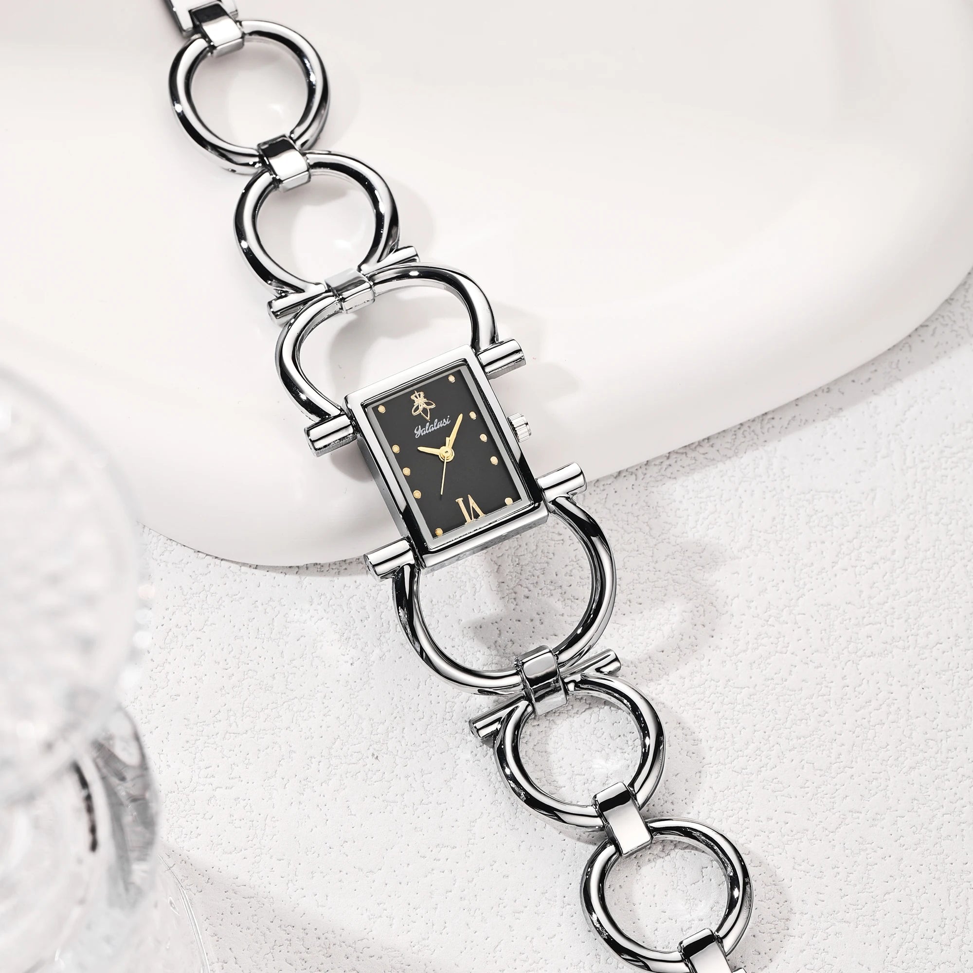 Silver case with black dial, ion-plated link bracelet, numberless face