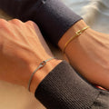 Geometric stainless steel bracelet in silver on wrist