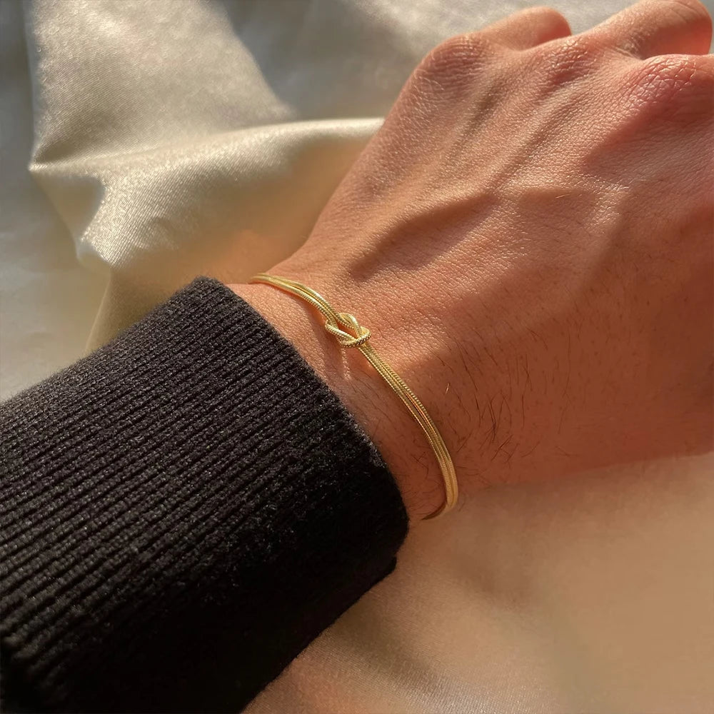 Sleek geometric links with lobster clasp close up