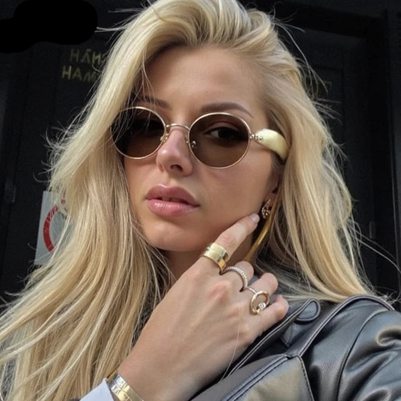 "Soleil oval sunglasses close-up showing UV400 gradient lens detail