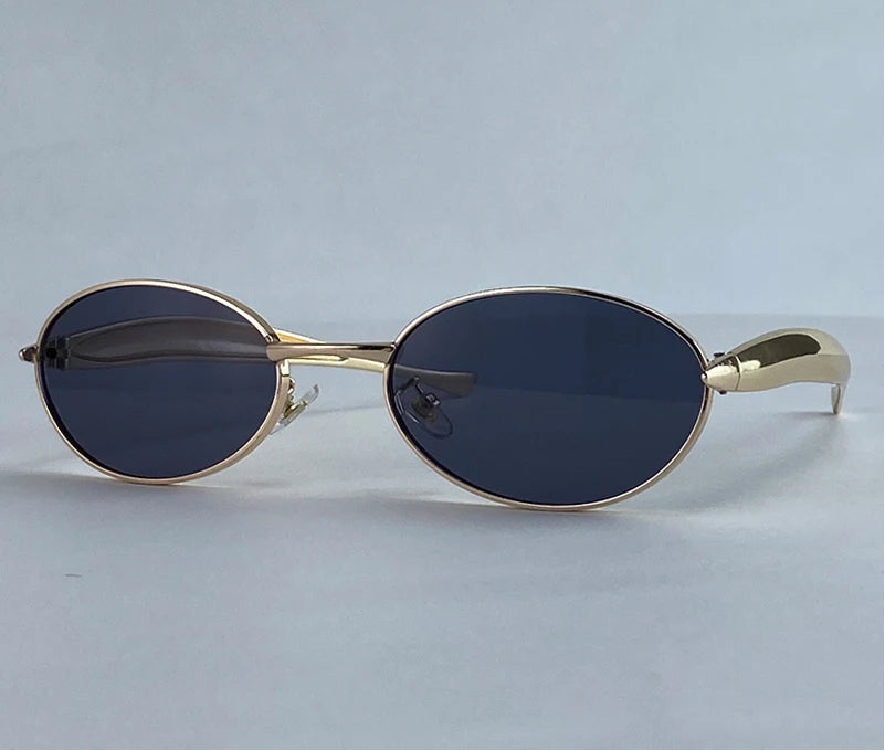 Soleil oval sunglasses in gold and gray gradient lenses