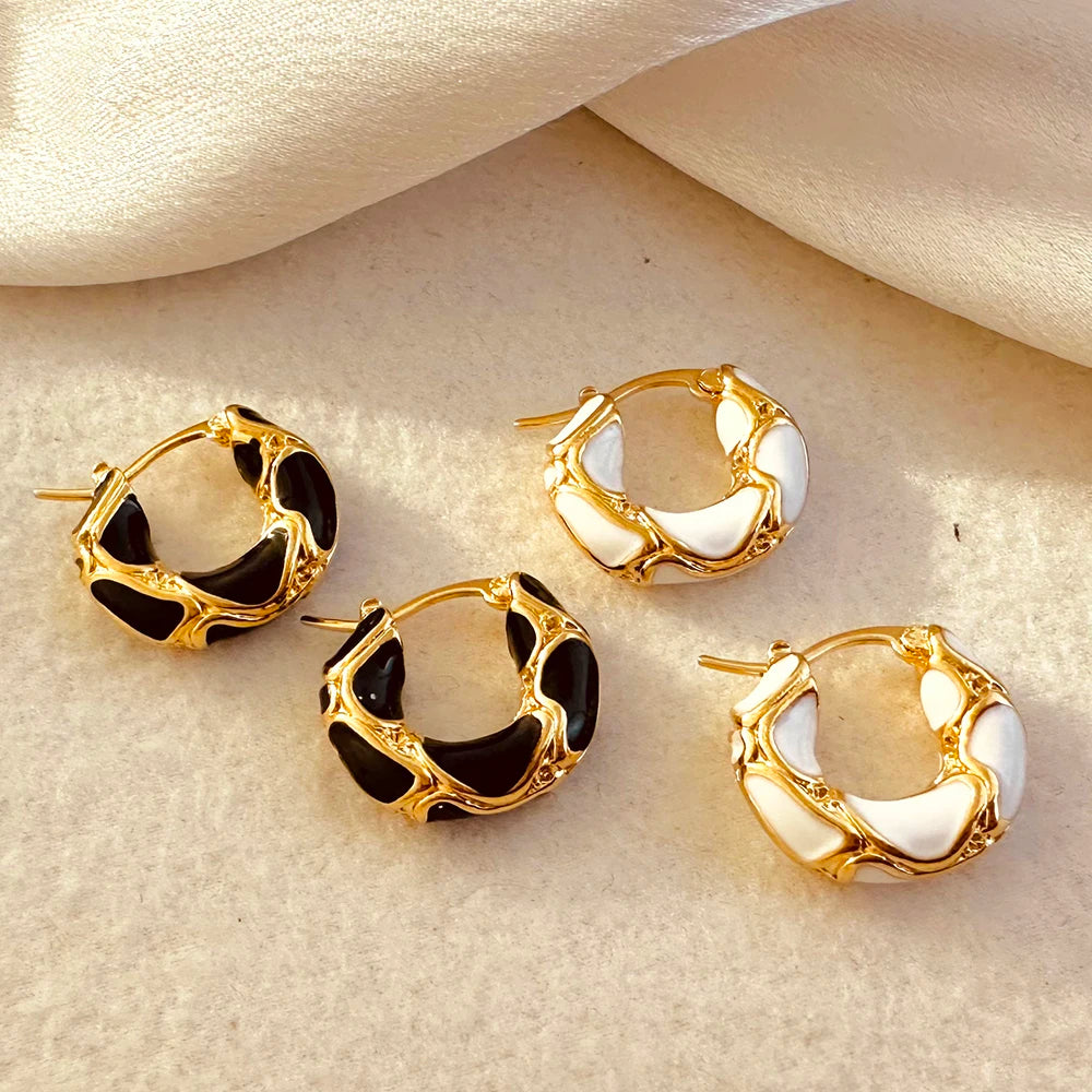 Black and white hoop earring styled together